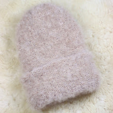 Load image into Gallery viewer, A furry hat with a twist brim