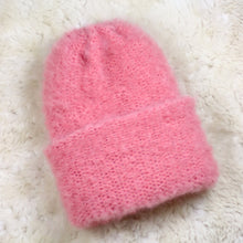 Load image into Gallery viewer, A furry hat with a twist brim