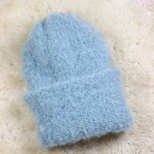 Load image into Gallery viewer, A furry hat with a twist brim