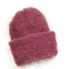 Load image into Gallery viewer, A furry hat with a twist brim