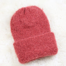 Load image into Gallery viewer, A furry hat with a twist brim