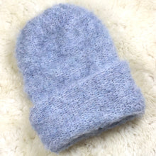 Load image into Gallery viewer, A furry hat with a twist brim