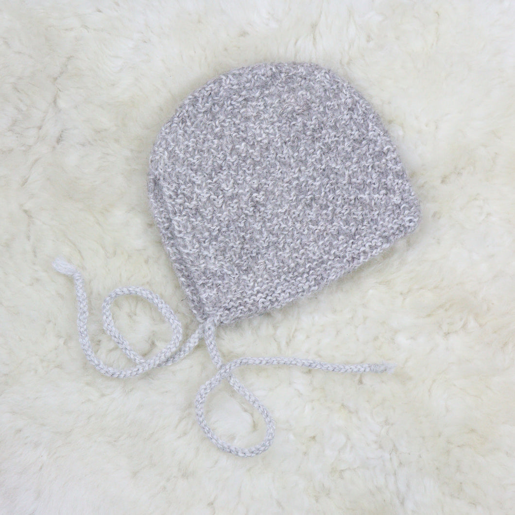 Family daughter's knitted baby hat