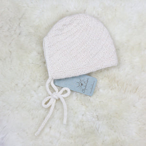 Family daughter's knitted baby hat